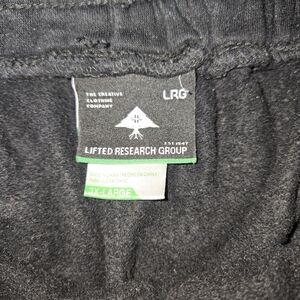 LRG Men's Black Athletic Shorts with Green Trim